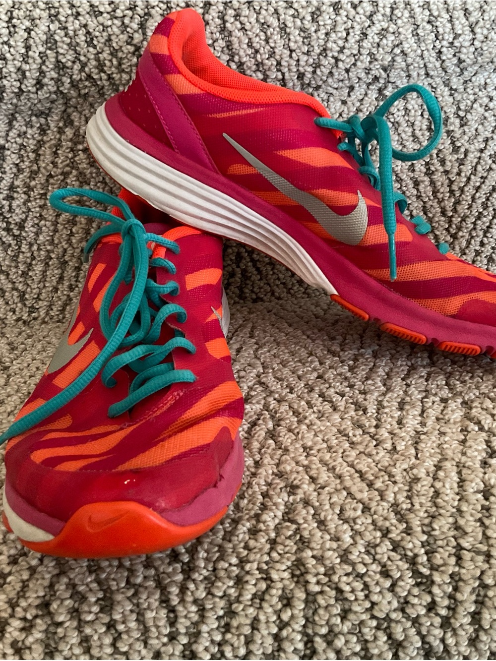 Nike Pink and Orange Women's Running Shoes with Teal Laces